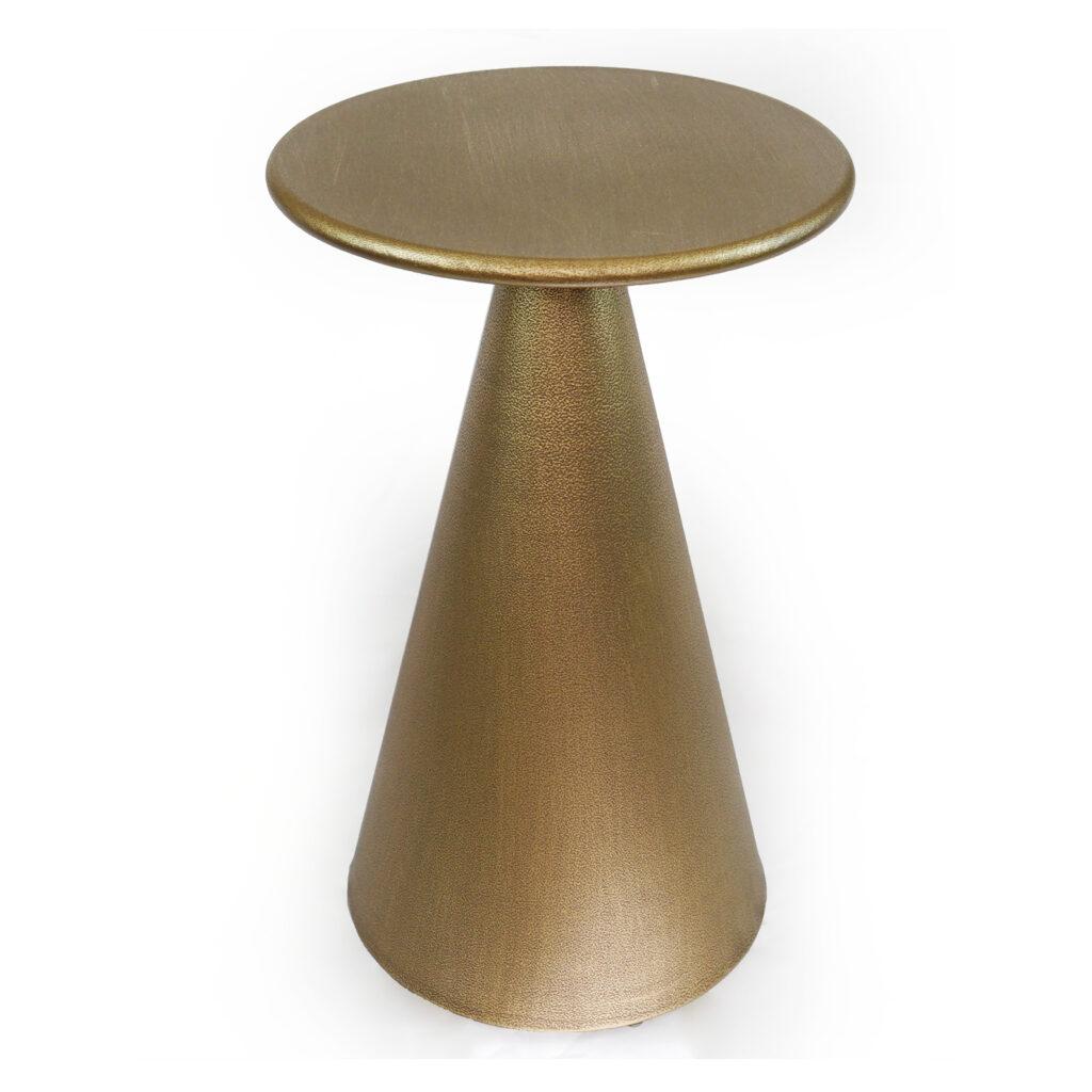 A high-angle studio photograph of a modern, pedestal-style metal side table, as shown in felichair metal side table golden.jpg, set against a seamless white background. The table features a sleek, thin circular top with a smooth brushed gold finish that reflects light subtly. This top rests on a robust, sculptural conical base that widens significantly toward the floor. The base is crafted with a detailed, finely textured hammered metal surface, giving it a rich, antique gold patina. The entire structure emphasizes geometric form and sophisticated metalwork.